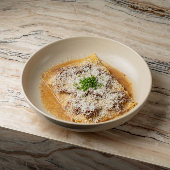 Lasagna with beef and pecorino cheese
