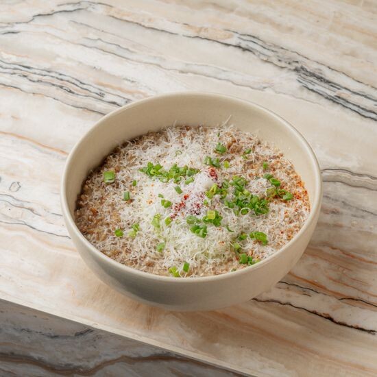 Buckwheat porridge with avocado, sundried tomatoes