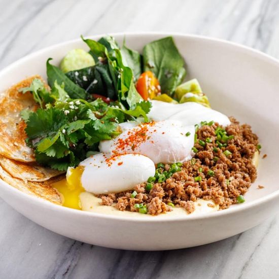 Big breakfast bowl, spiced beef, humus, roti, salad