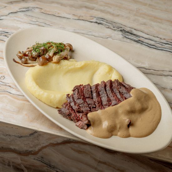 Skirt steak, pepper sauce, mashed potatoes