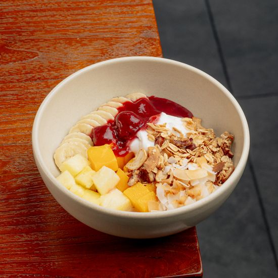 Coconut yogurt, mango, berry compote, granola